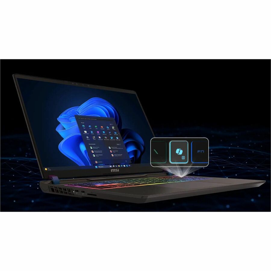 Laptop with a blue flower design on the screen against a dark background