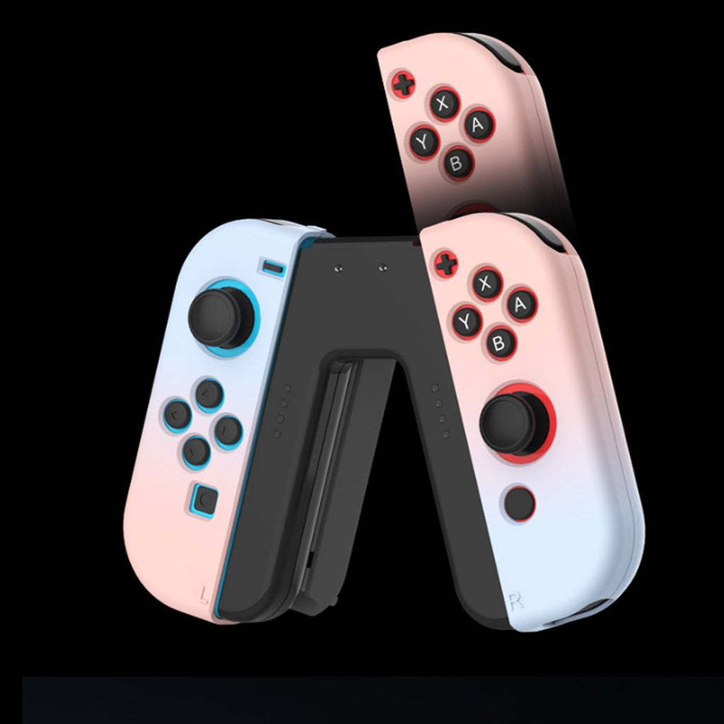Pair of gaming controllers with a black background