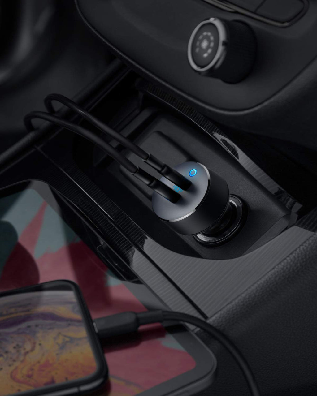 Car charger with phone cable inside a car console