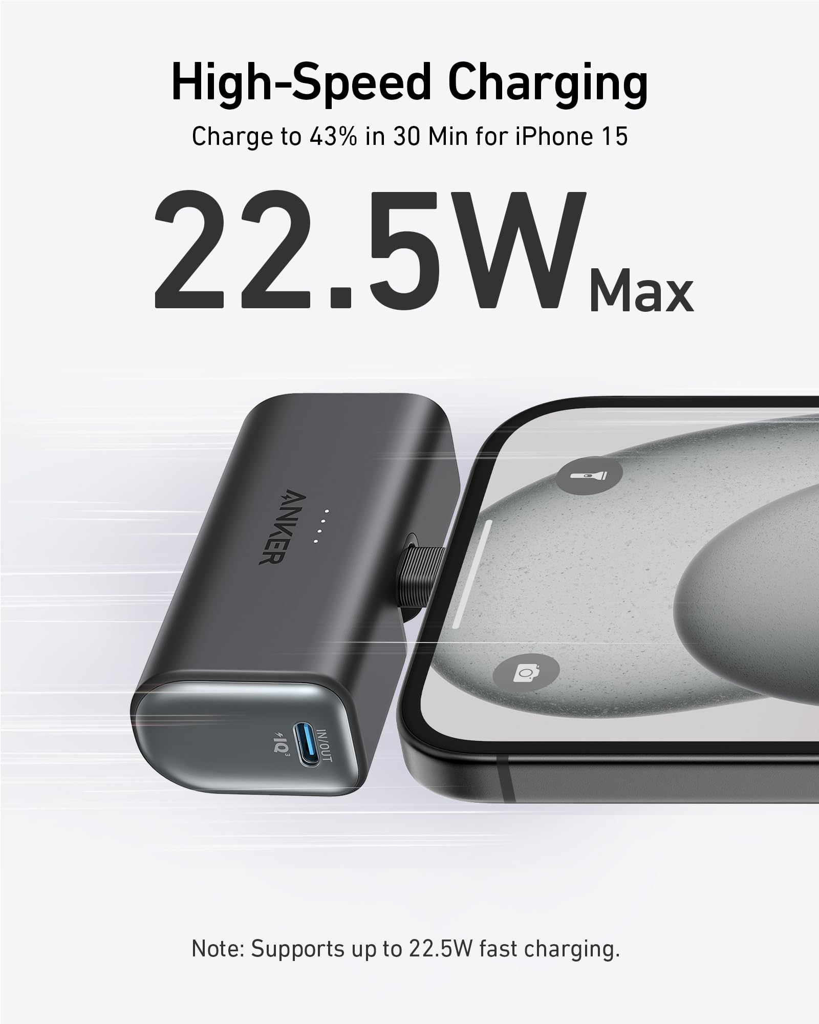 Anker power bank with smartphone on a white background, highlighting high-speed charging capabilities.