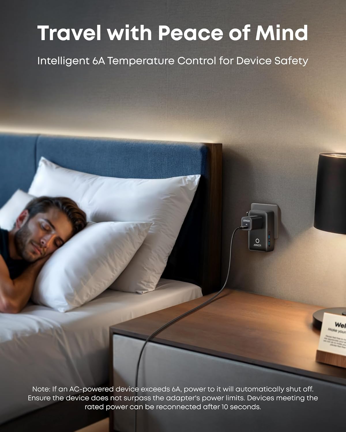 Man sleeping in bed with a nightstand featuring a smart plug and lamp.