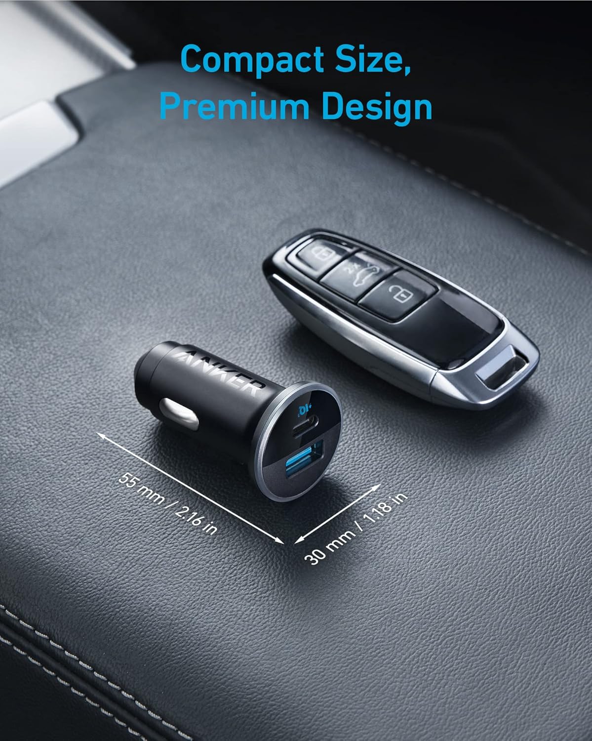 Car charger and key fob on a car dashboard with size measurement text.