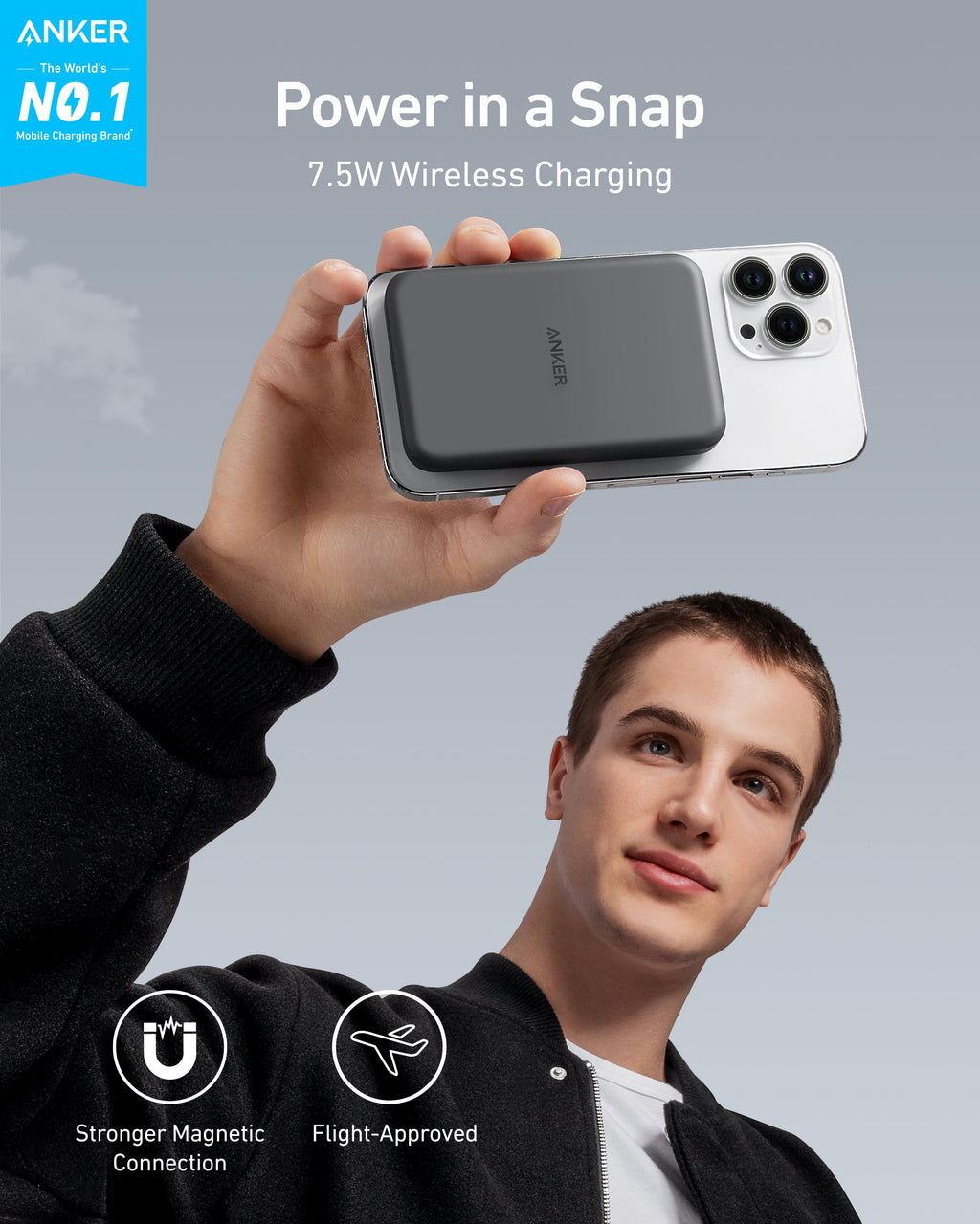 Person holding a wireless charging device with Anker branding and text about power and charging technology.