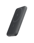 Black wireless charging pad on a white background