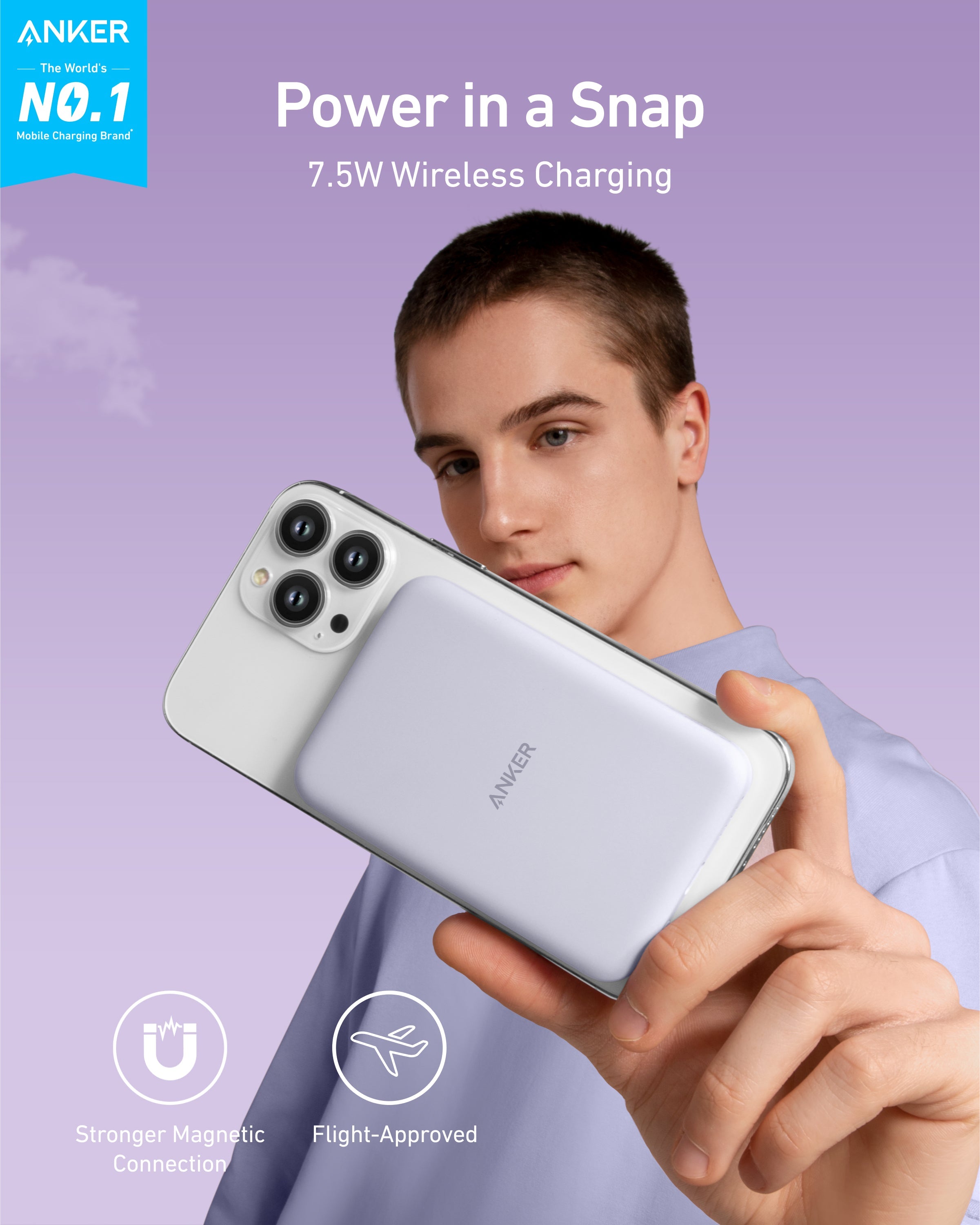 Person holding a smartphone with Anker branding against a purple background