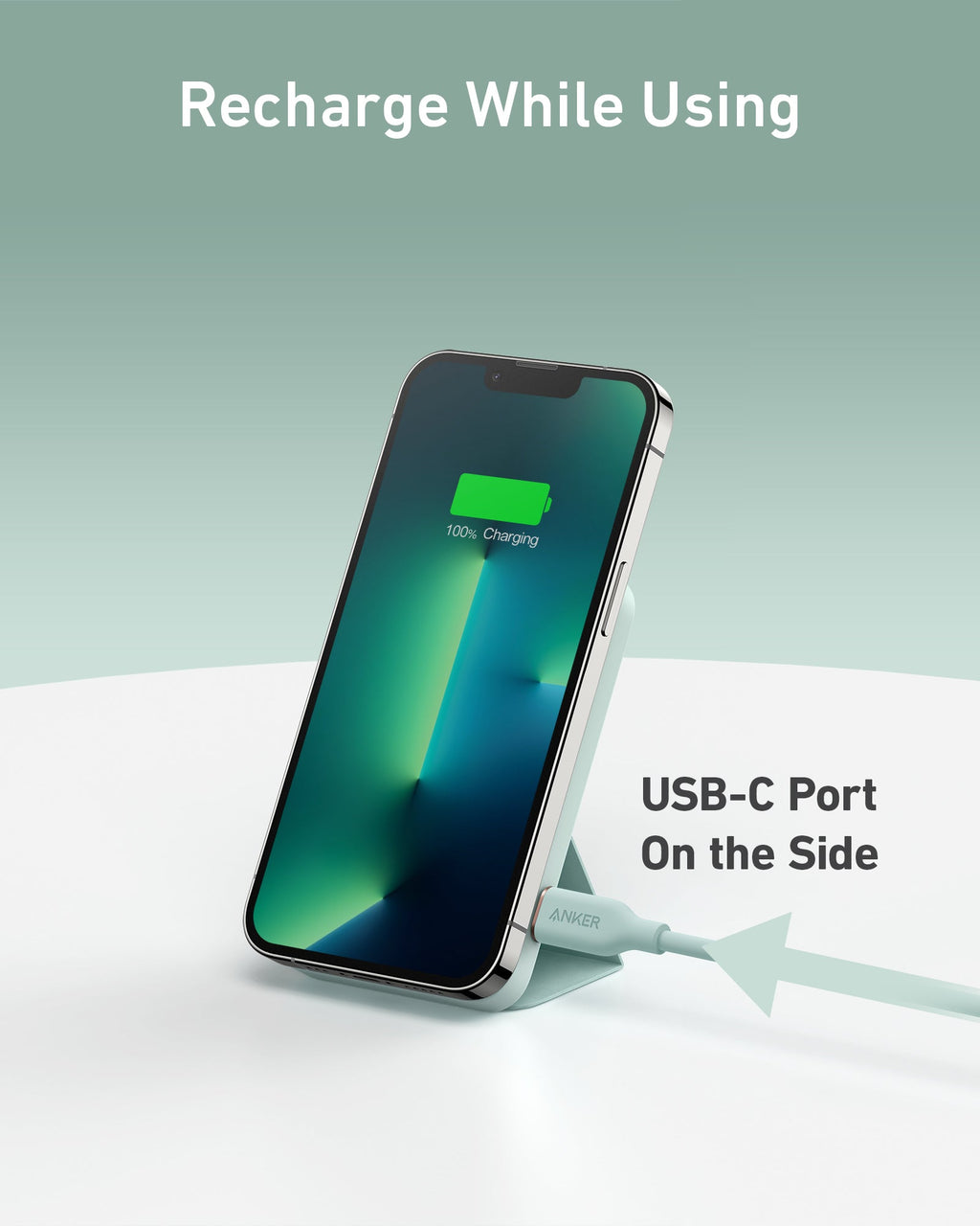Smartphone with a charging cable connected to a USB-C port on a light gray background.