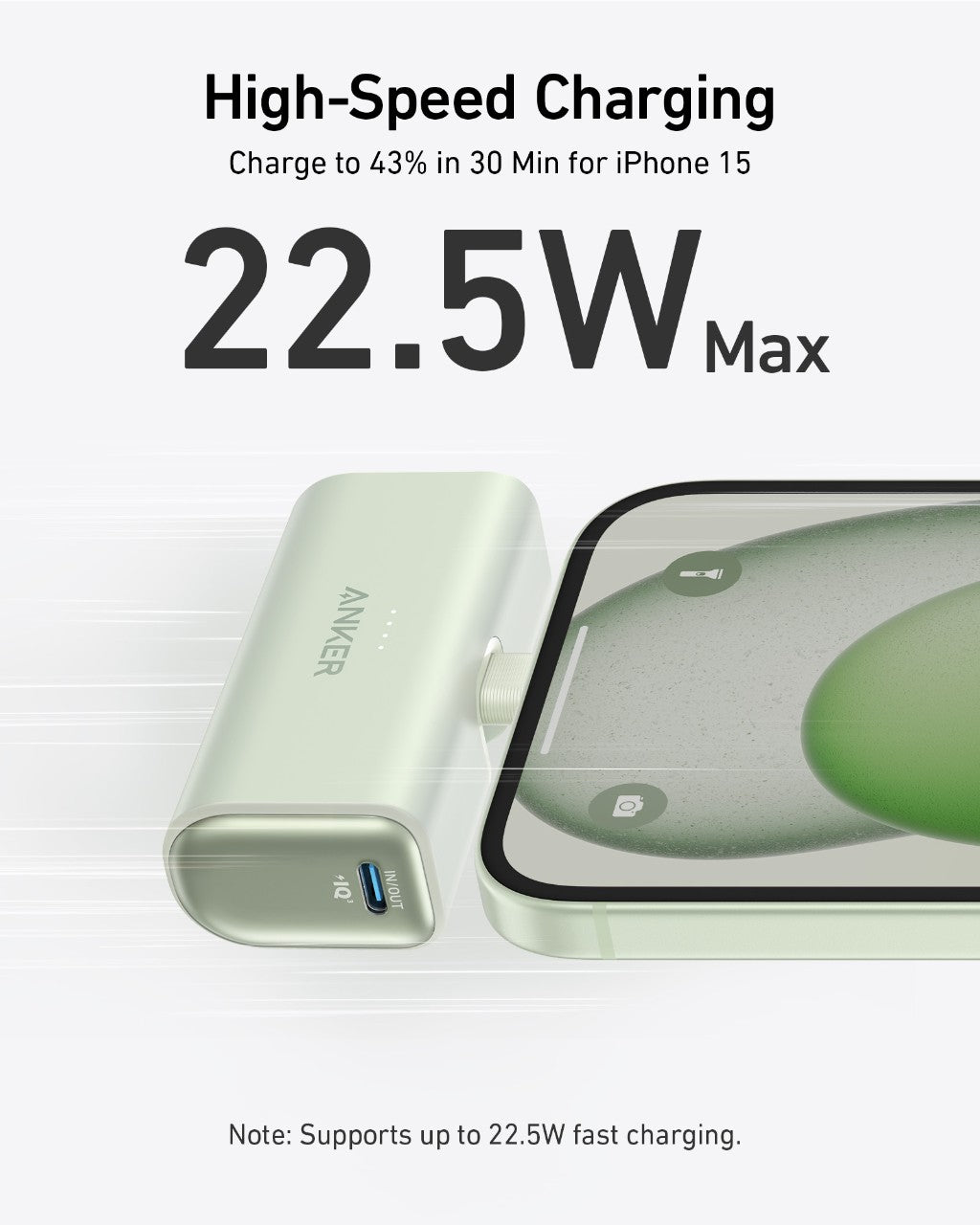 Anker power bank with smartphone on a white background, highlighting high-speed charging capabilities.