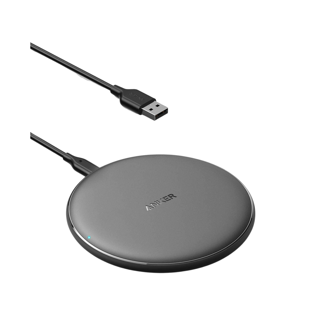 Wireless charging pad with USB cable on a white background