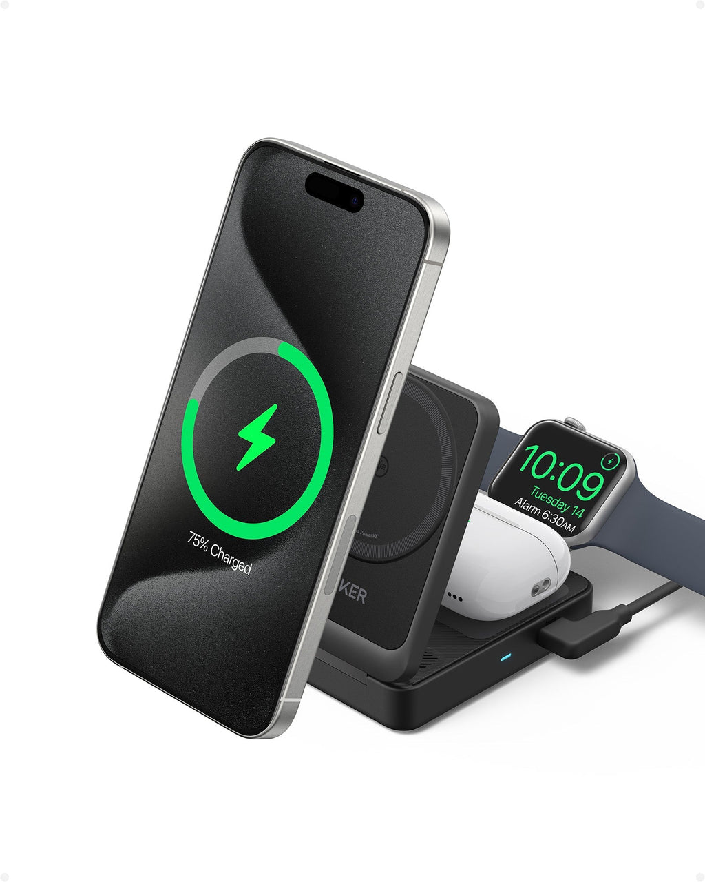 Wireless charging station with smartphone, smartwatch, and headphones on a white background