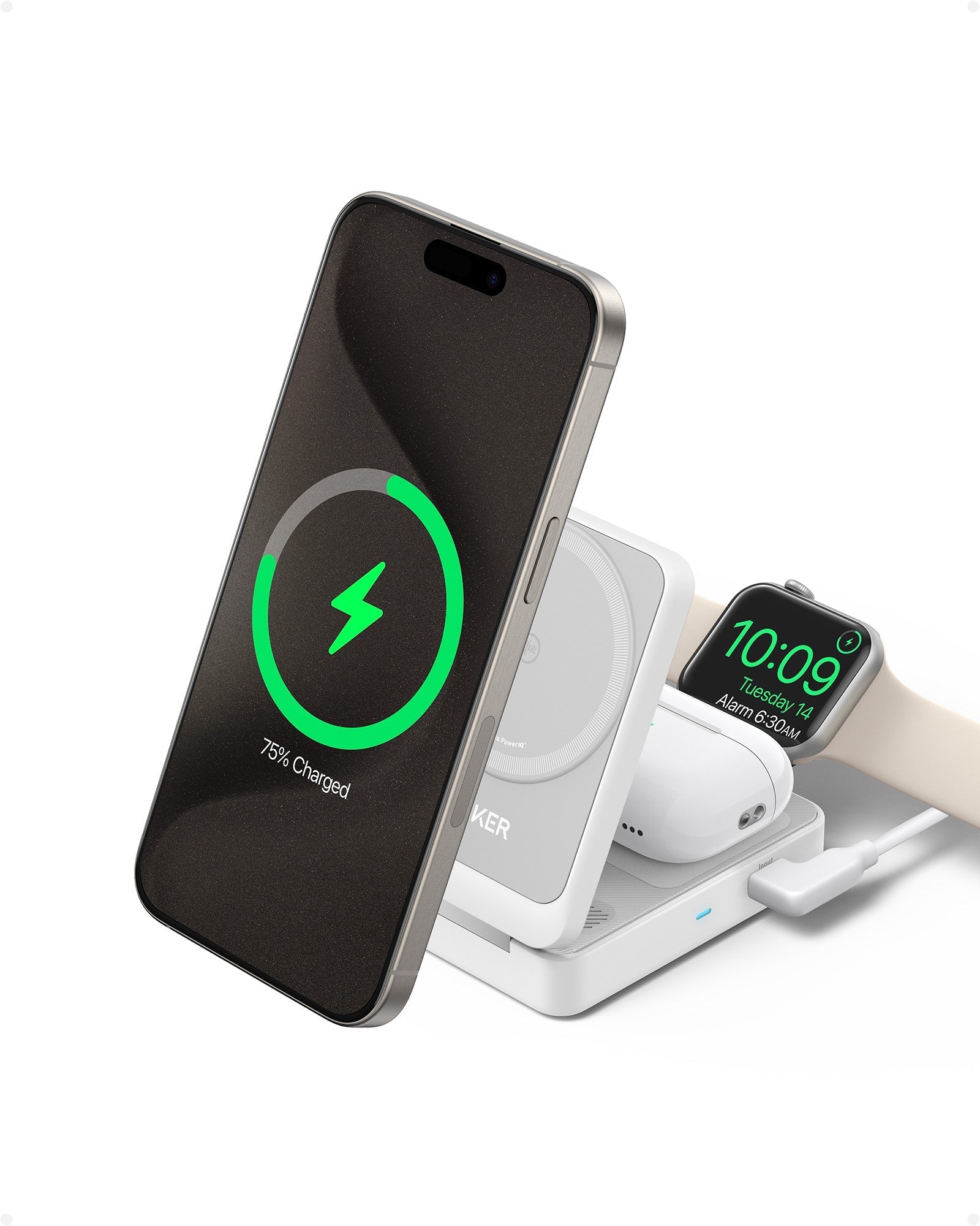 Wireless charging station with smartphone and smartwatch on a white background