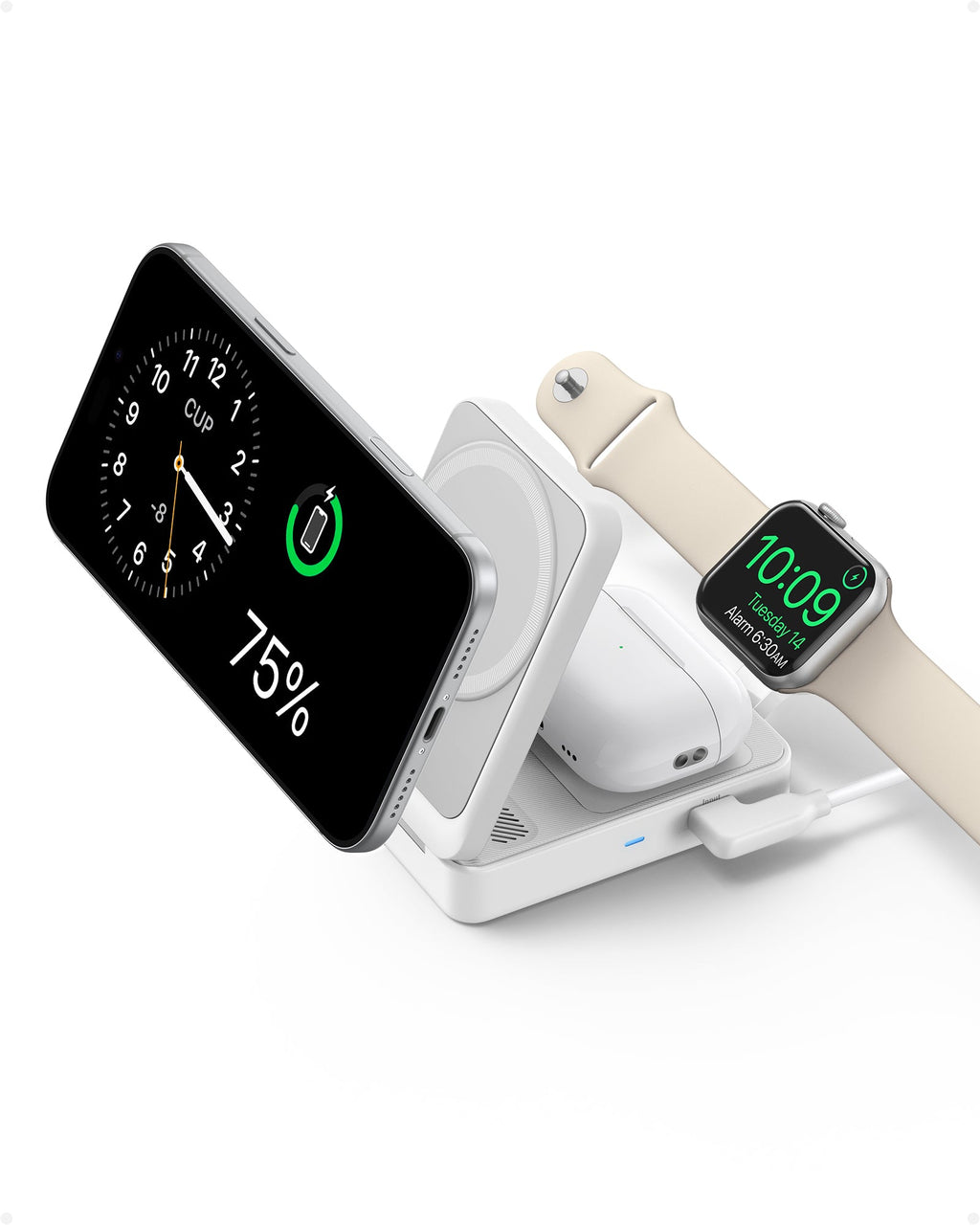 Multi-device charging stand with smartphone, smartwatch, and AirPods on a white background