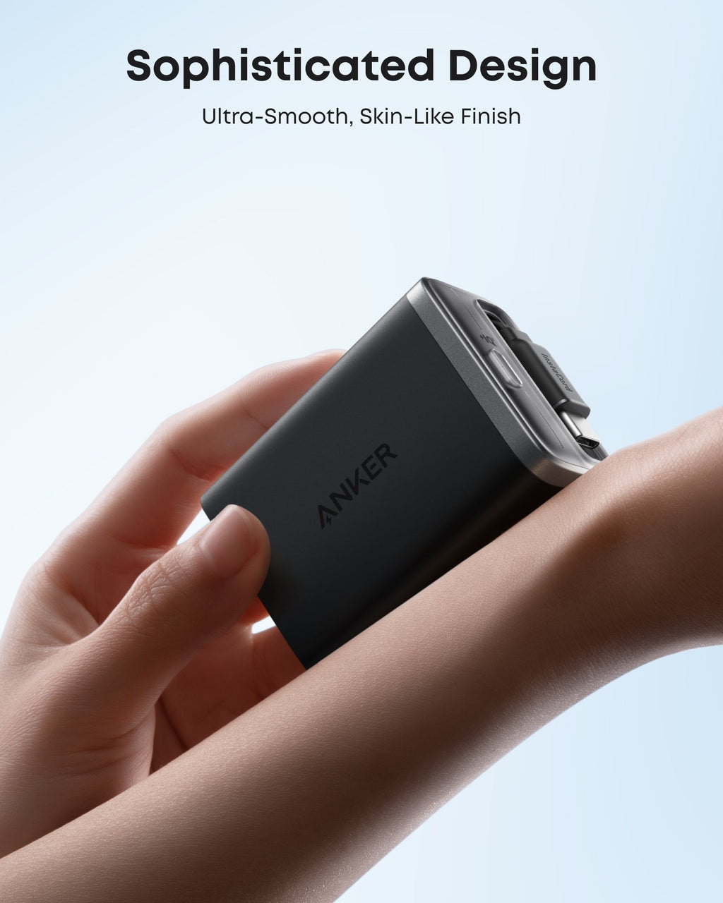 Anker power bank held in a hand with text about design and finish.