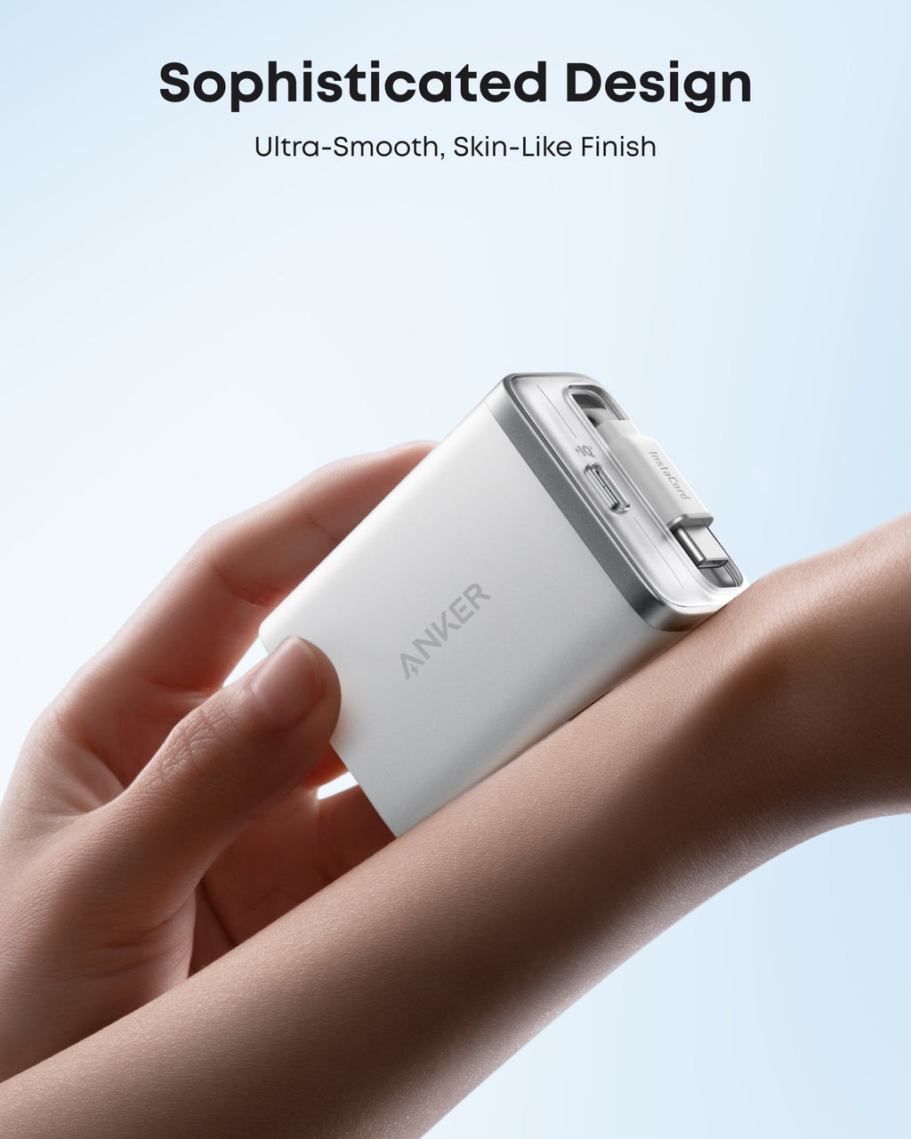 Anker power bank held in a hand with text about design and finish.