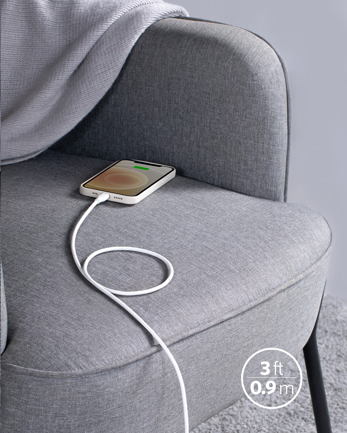 Phone with a white cable on a gray chair, showing a 3-foot length measurement.