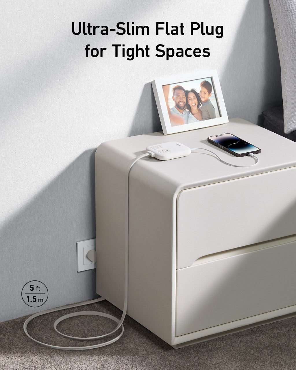 Ultra-slim flat plug on a nightstand with a phone and photo frame, text 'Ultra-Slim Flat Plug for Tight Spaces'.