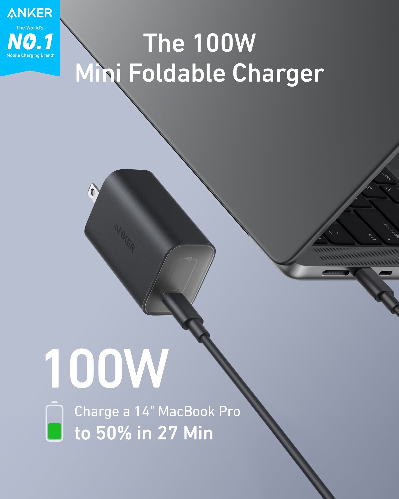 Anker 100W mini foldable charger with laptop on gray background