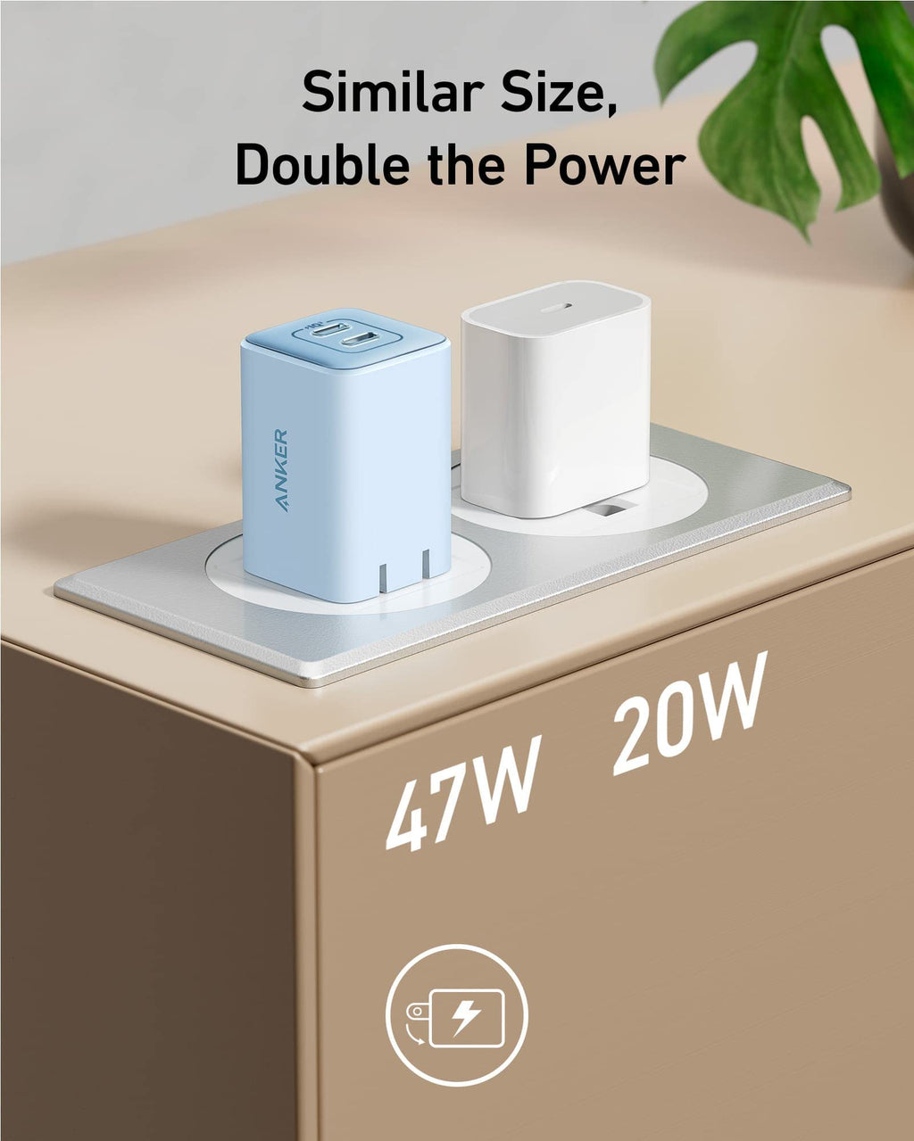 Two power adapters on a surface with text indicating power output and a brand logo.