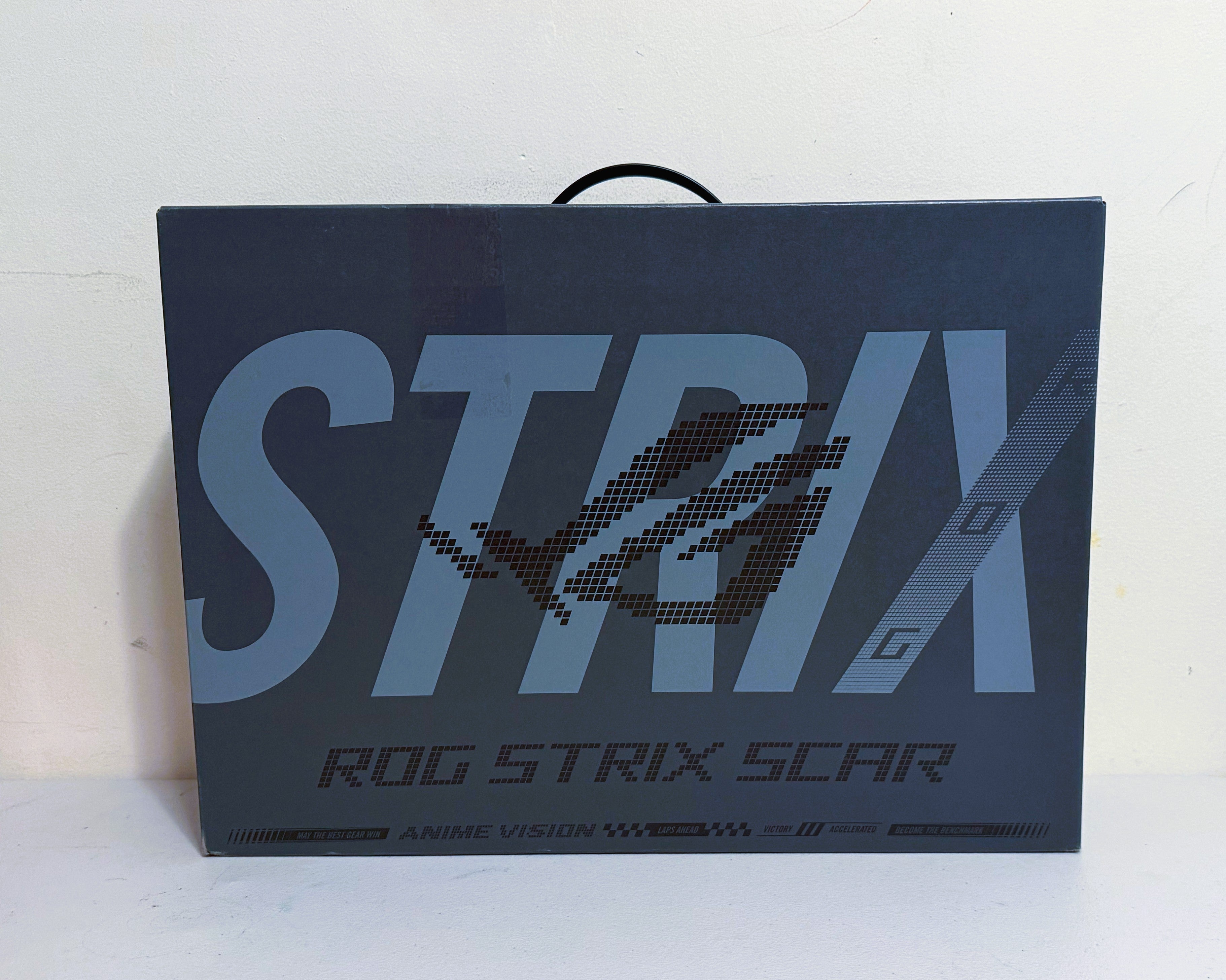 ROG Strix gaming product packaging on a white background