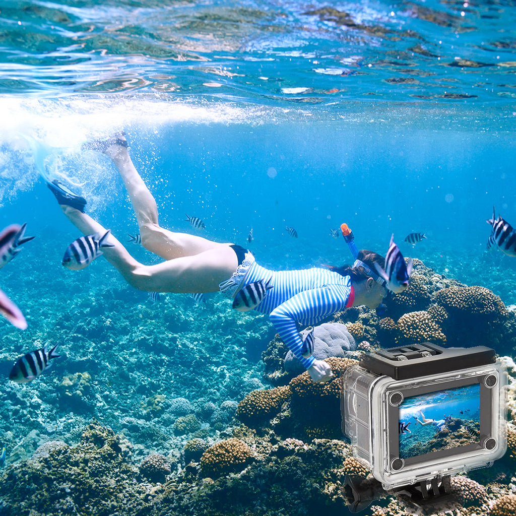 Person snorkeling with a GoPro camera capturing underwater footage.