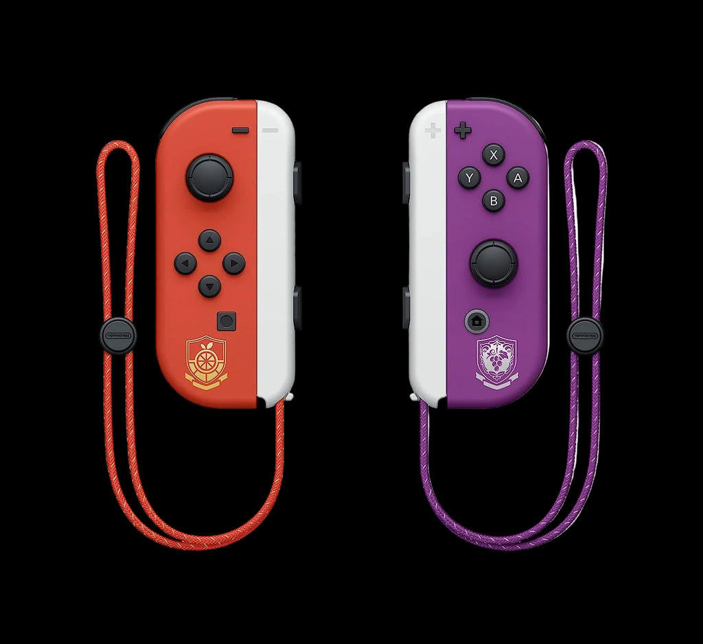 Two gaming controllers, one red and white, one purple and white, with attached straps on a white background.