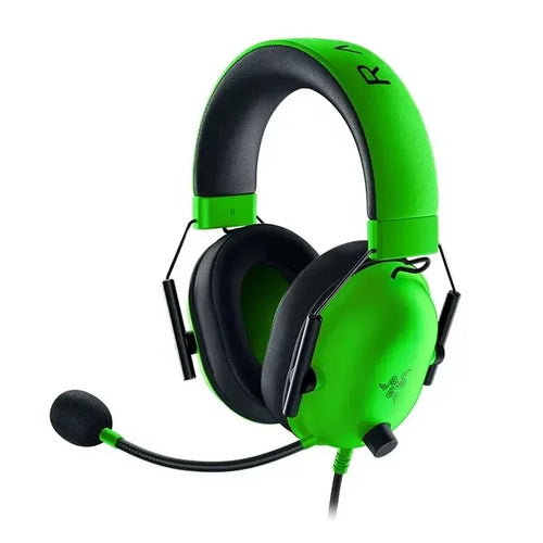 Green gaming headset with black accents on a white background
