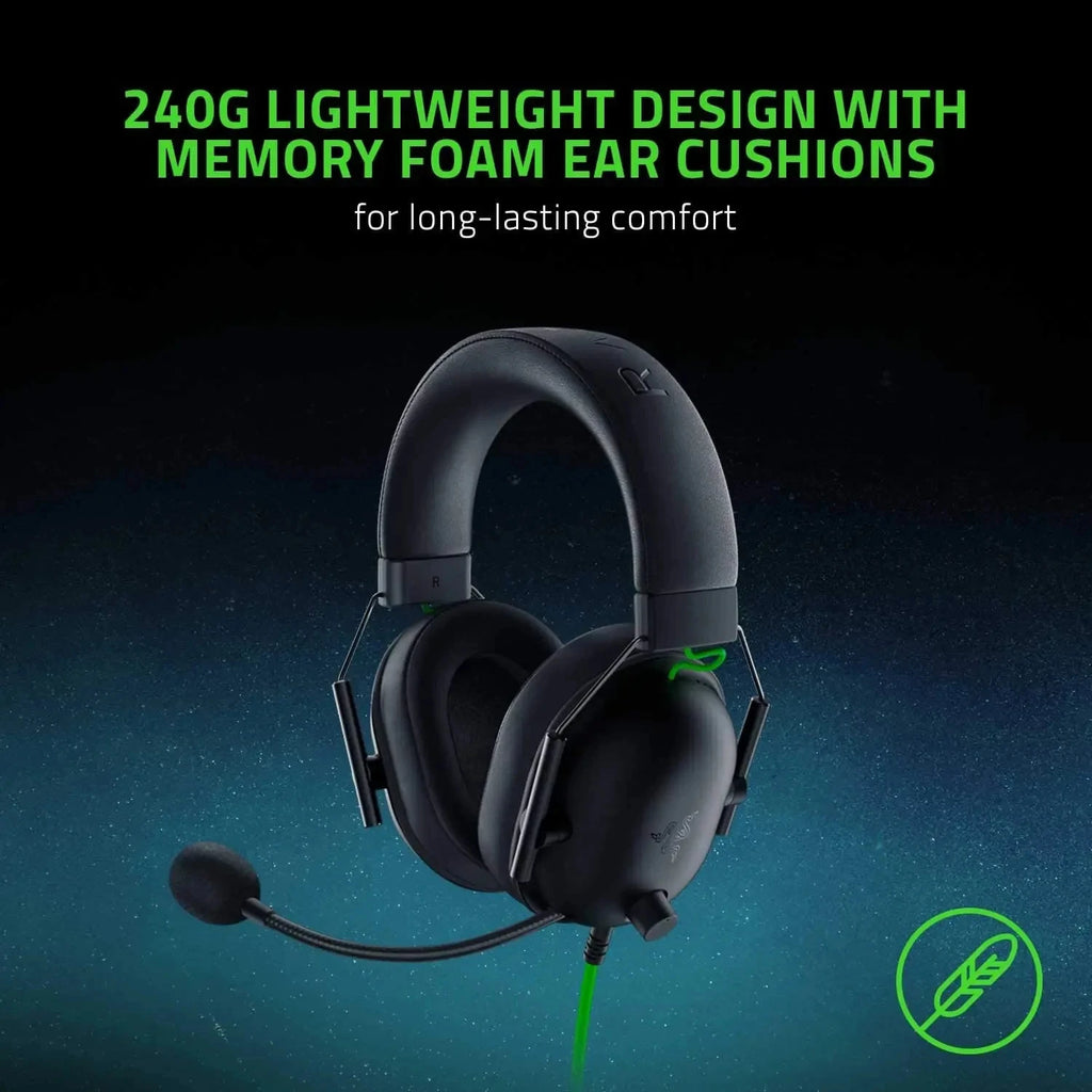 Black gaming headset with memory foam ear cushions on a dark blue gradient background