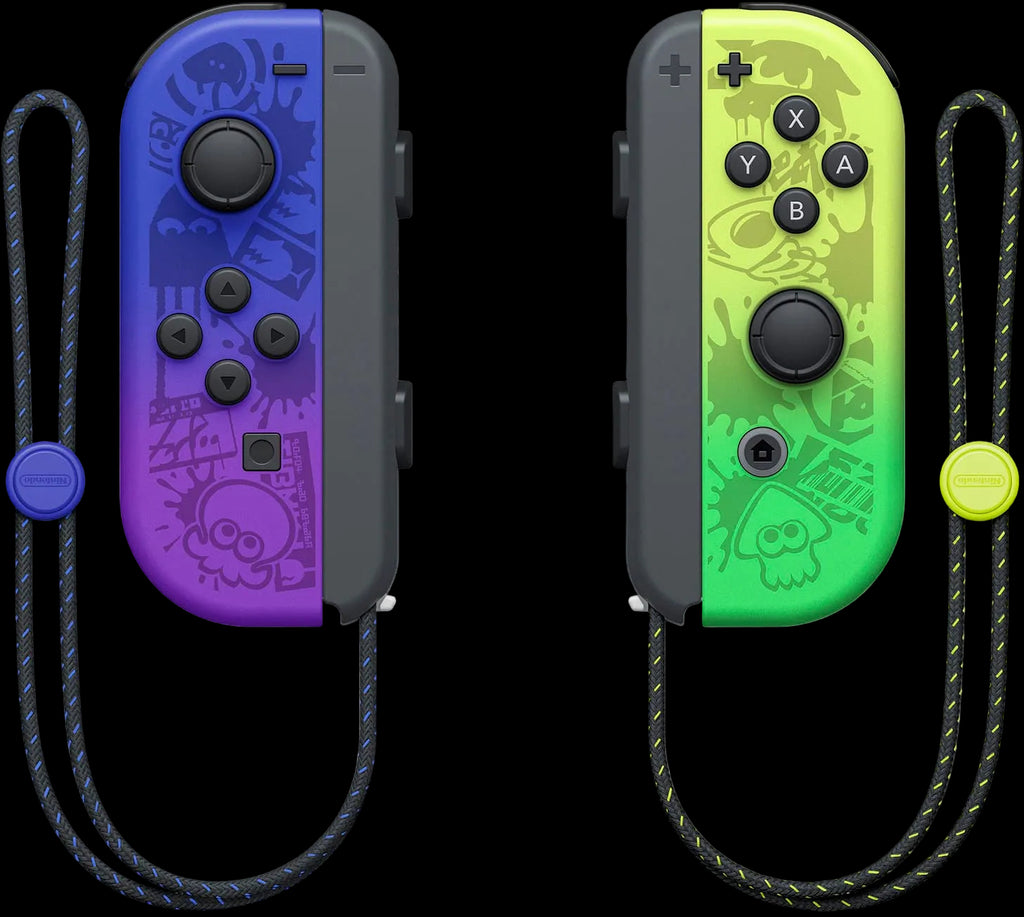 Two gaming controllers, one blue and purple, the other green and black, on a white background.