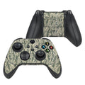 Gaming controller with camouflage pattern on a white background
