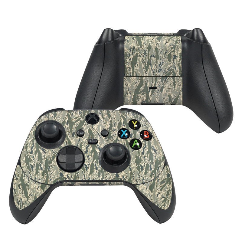 Gaming controller with camouflage pattern on a white background