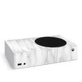 Gaming console with marble pattern skin on a white background