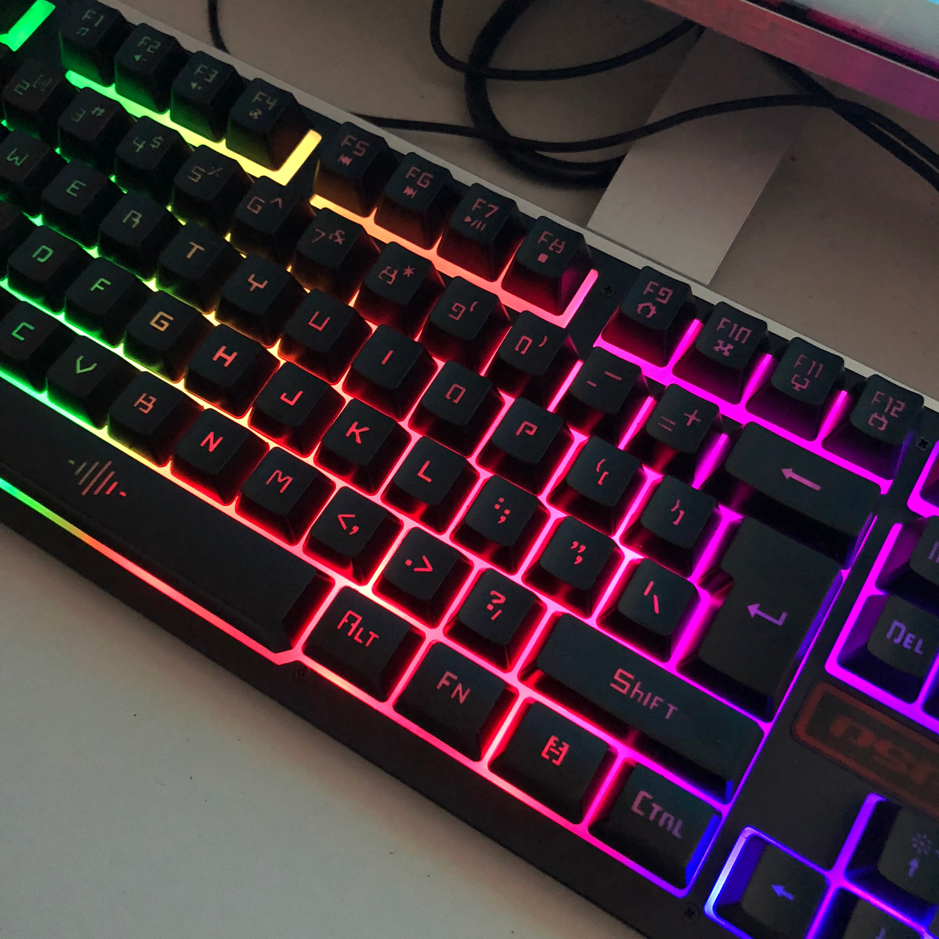 Keyboard with RGB lighting on a desk