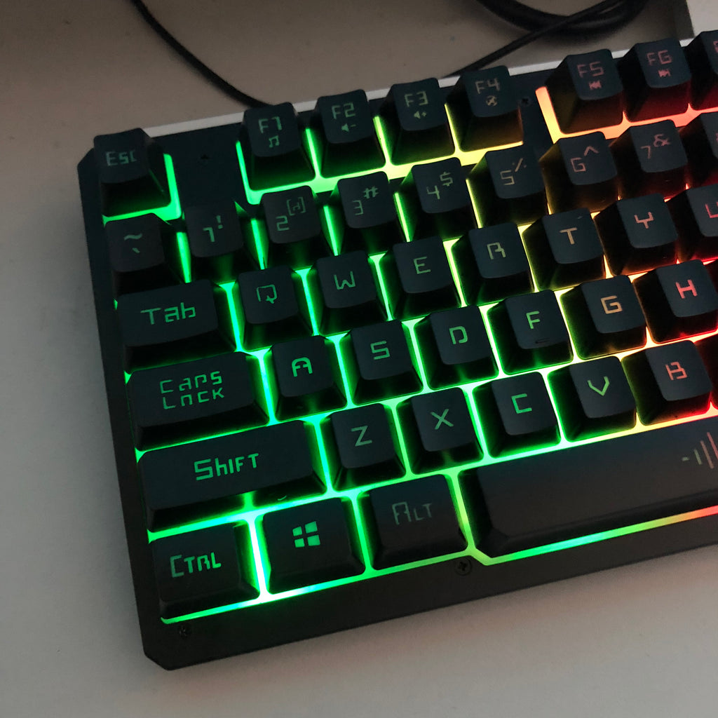 Mechanical keyboard with RGB lighting on a white surface