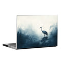 Laptop with a nature-themed design featuring a crane on a misty lake