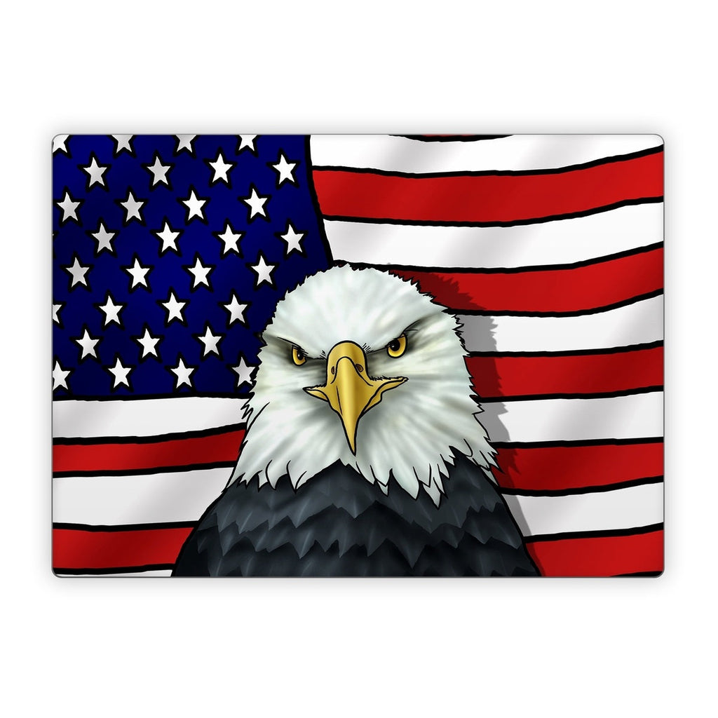 Bald eagle in front of an American flag