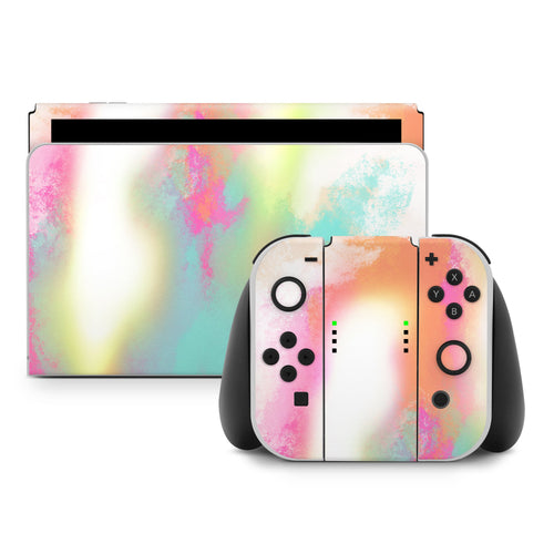 Nintendo Switch console and controller with a colorful watercolor skin on a white background
