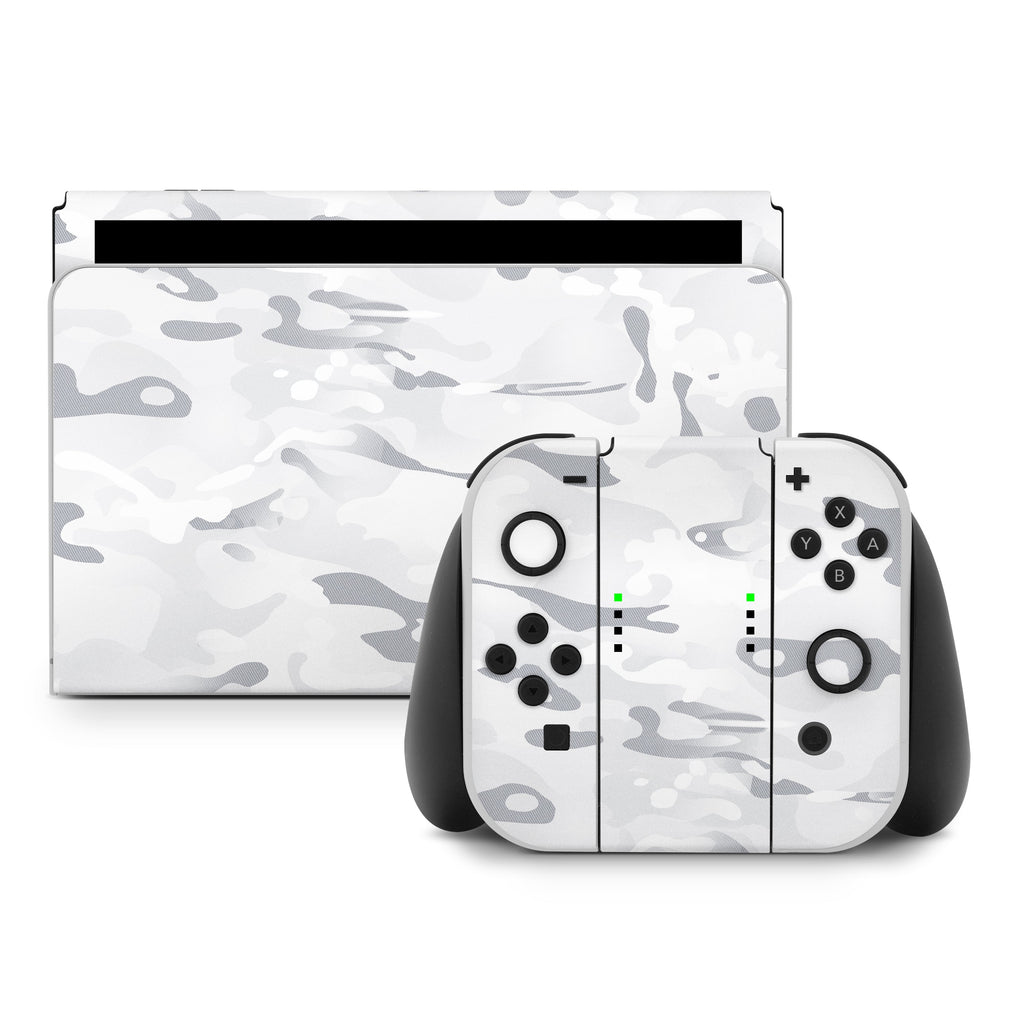 Gaming console and controllers with white camouflage design on a white background