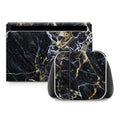 Gaming console with marble patterned cover on a white background