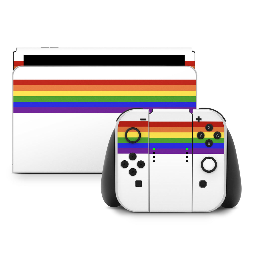 Gaming console and controller with rainbow design on a white background