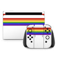 Gaming console and controller with rainbow design on a white background