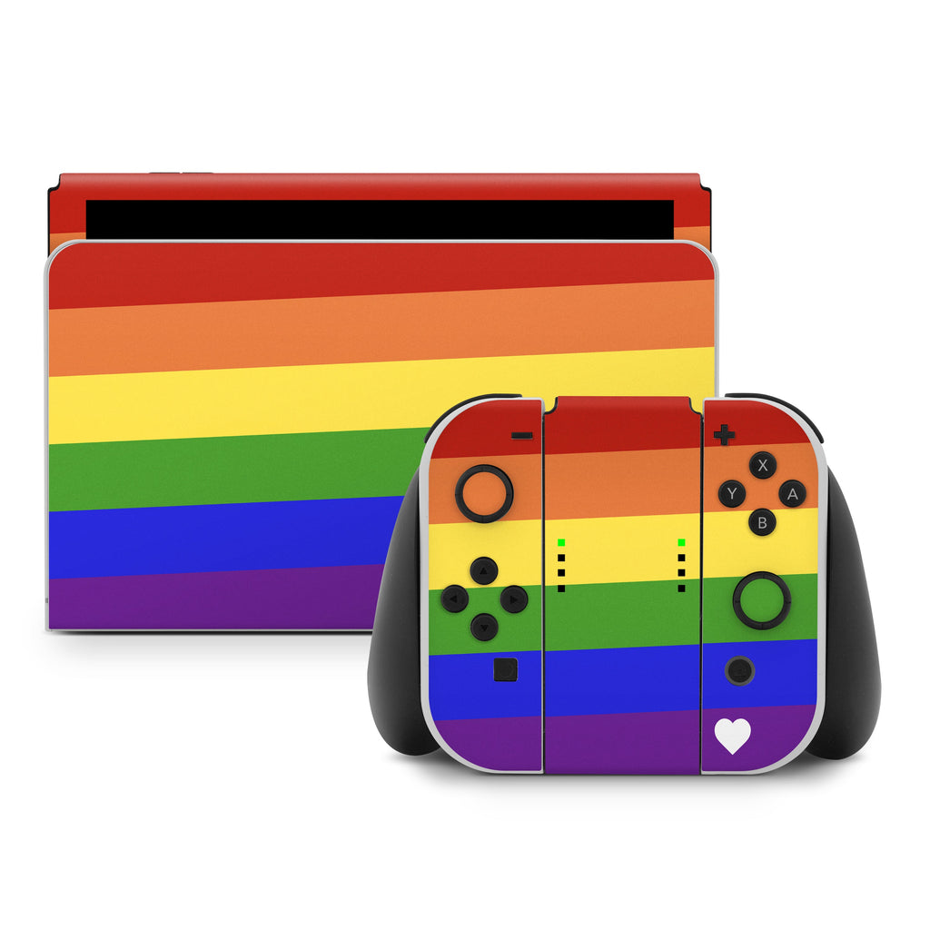 Gaming console and controller with rainbow design on a white background