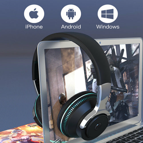 Headphones in front of a laptop screen with Apple, Android, and Windows logos above.