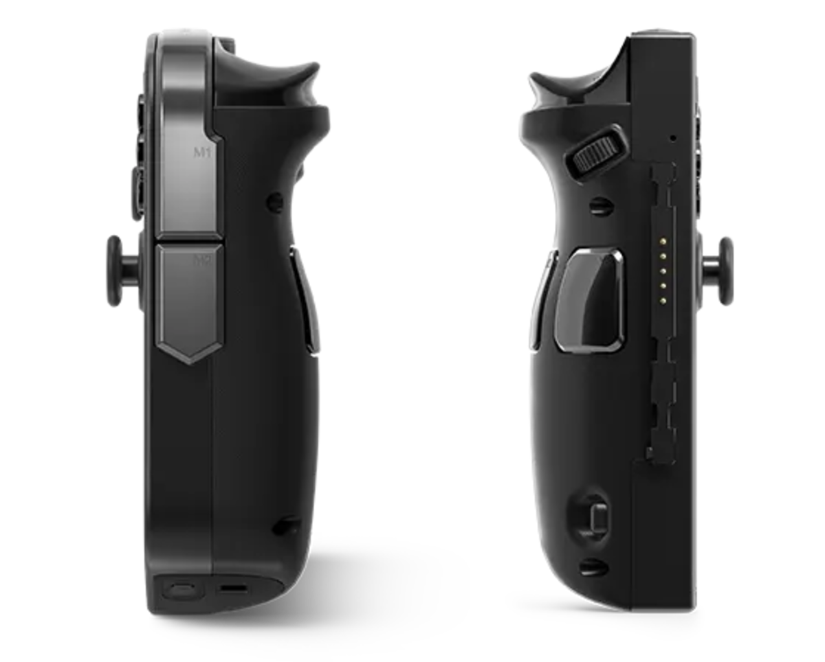 Black tactical gun grip and rail on a white background