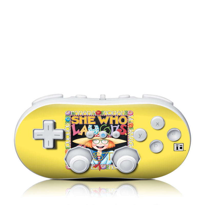 Yellow gaming console with character design on a white background