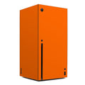 Orange gaming console with black accents on a white background