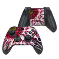 Gaming controller with floral design on a white background